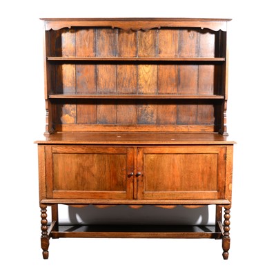 Lot 5 - An oak dining room suite