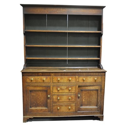 Lot 4 - A late Georgian oak and mahogany dresser
