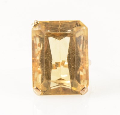 Lot 41 - A citrine dress ring.