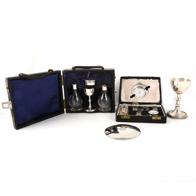 Lot 176 - Two travelling communion sets, one silver, the other plated, and another paten and chalice.