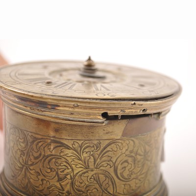 Lot 150 - A Charles II style brass drum-shape table clock, 17th Century