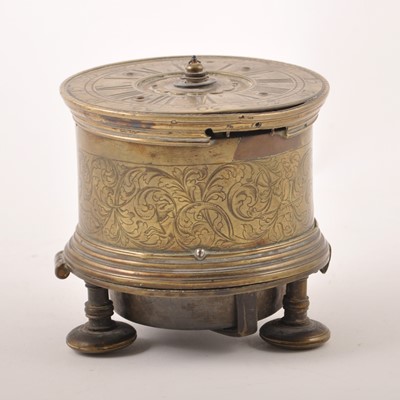Lot 150 - A Charles II style brass drum-shape table clock, 17th Century
