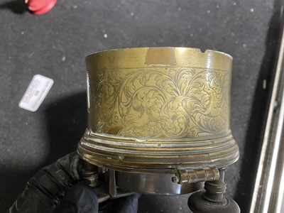 Lot 150 - A Charles II style brass drum-shape table clock, 17th Century