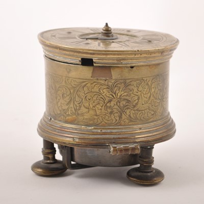 Lot 150 - A Charles II style brass drum-shape table clock, 17th Century