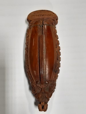 Lot 75 - A carved coquilla nut snuff box, designed as the French ship-of-the-line Victoire
