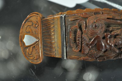 Lot 75 - A carved coquilla nut snuff box, designed as the French ship-of-the-line Victoire
