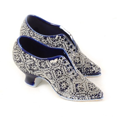 Lot 13 - A pair of Continental porcelain miniature shoes