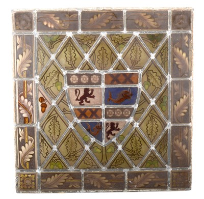 Lot 85 - A leaded and stained glass armorial panel, and five other panels