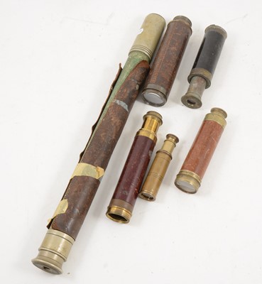 Lot 1117 - Leather bound metal single drawer telescope