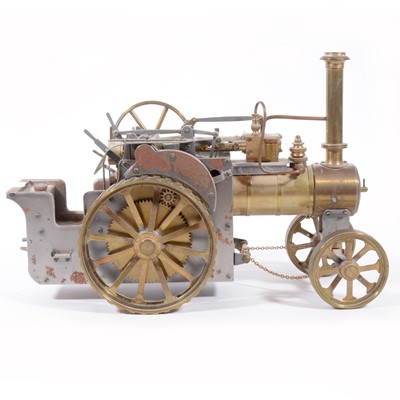 Lot 117 - DRM Engineers Birmingham scale model traction engine, brass construction with mechanical flywheel, 30cm length, unpainted.