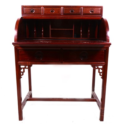 Lot 71 - A Chinese stained hardwood cylinder-front bureau