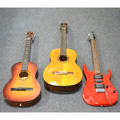 Lot 66 - Ibanez EX series electric guitar, red, a small Torque guitar amp, and two acustic guitars.