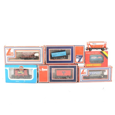 Lot 150 - Thirty-two OO gauge model railway wagons, by Hornby, Lima, Airfix and others.