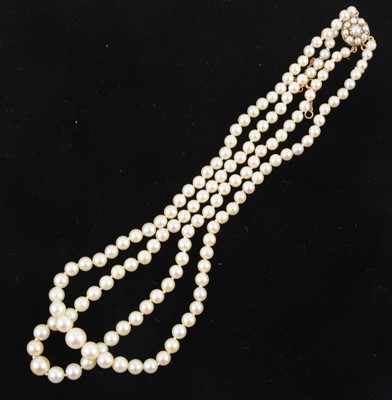 Lot 347 - A two row cultured pearl necklace.