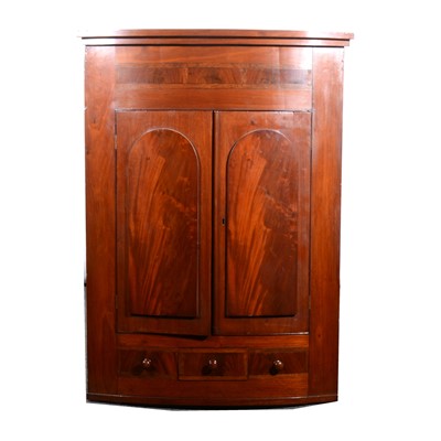 Lot 160 - A Victorian mahogany bowfront corner cupboard