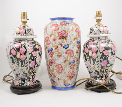 Lot 1055 - A pair of contemporary lamp bases, another lamp base, and a vase