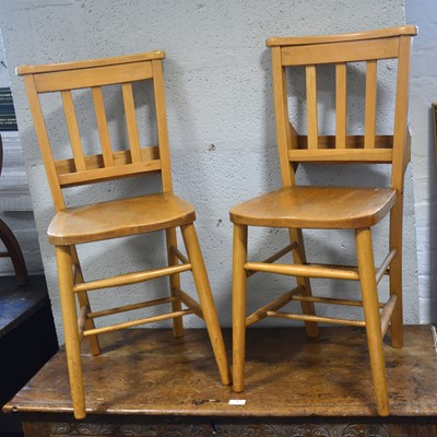 Lot 59 - A set of eleven beech and mixed wood Chapel chairs