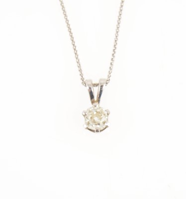 Lot 203A - A diamond solitaire pendant and chain.