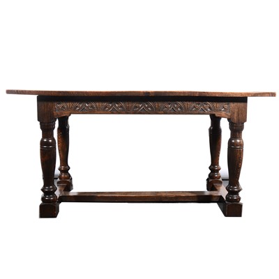 Lot 38 - An oak dining table, rectangular boarded top