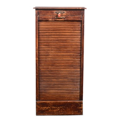 Lot 66 - An oak tambour front filing cabinet