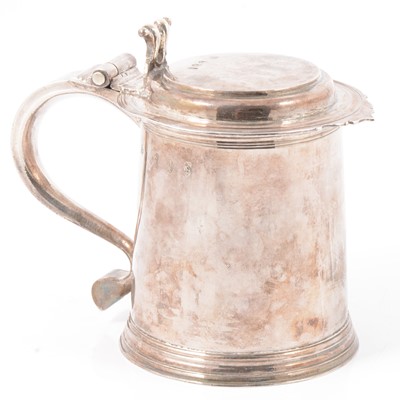 Lot 218 - Queen Anne Britannia silver lidded tankard, Thomas Parr, London 1702.