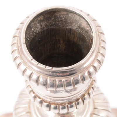 Lot 217 - Pair of Queen Anne Britannia silver candlesticks, John East, London 1702.