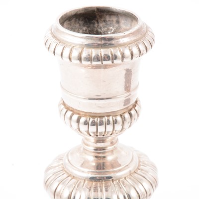 Lot 217 - Pair of Queen Anne Britannia silver candlesticks, John East, London 1702.