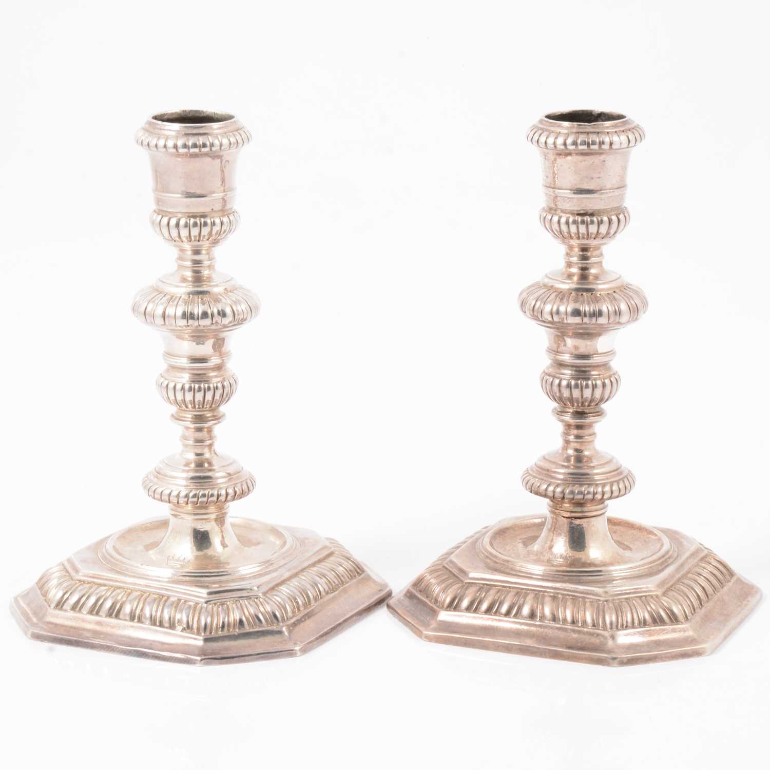 217 - Pair of Queen Anne Britannia silver candlesticks, John East, London 1702.