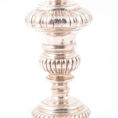 Lot 217 - Pair of Queen Anne Britannia silver candlesticks, John East, London 1702.