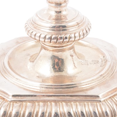 Lot 217 - Pair of Queen Anne Britannia silver candlesticks, John East, London 1702.