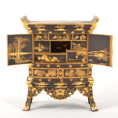 Lot 30 - A Japanese iron and gilt decorated Kodansu table cabinet, attributed to the Komai Company