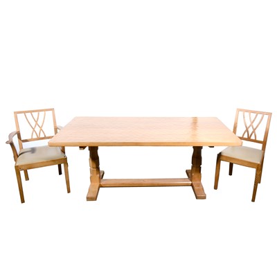 Lot 597 - Derek 'Lizardman' Slater of Crayke, an Arts & Crafts oak dining room suite