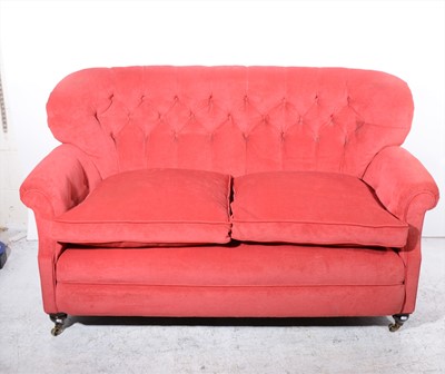 Lot 149 - A traditional style two-seat settee, and two matching wing-back chairs