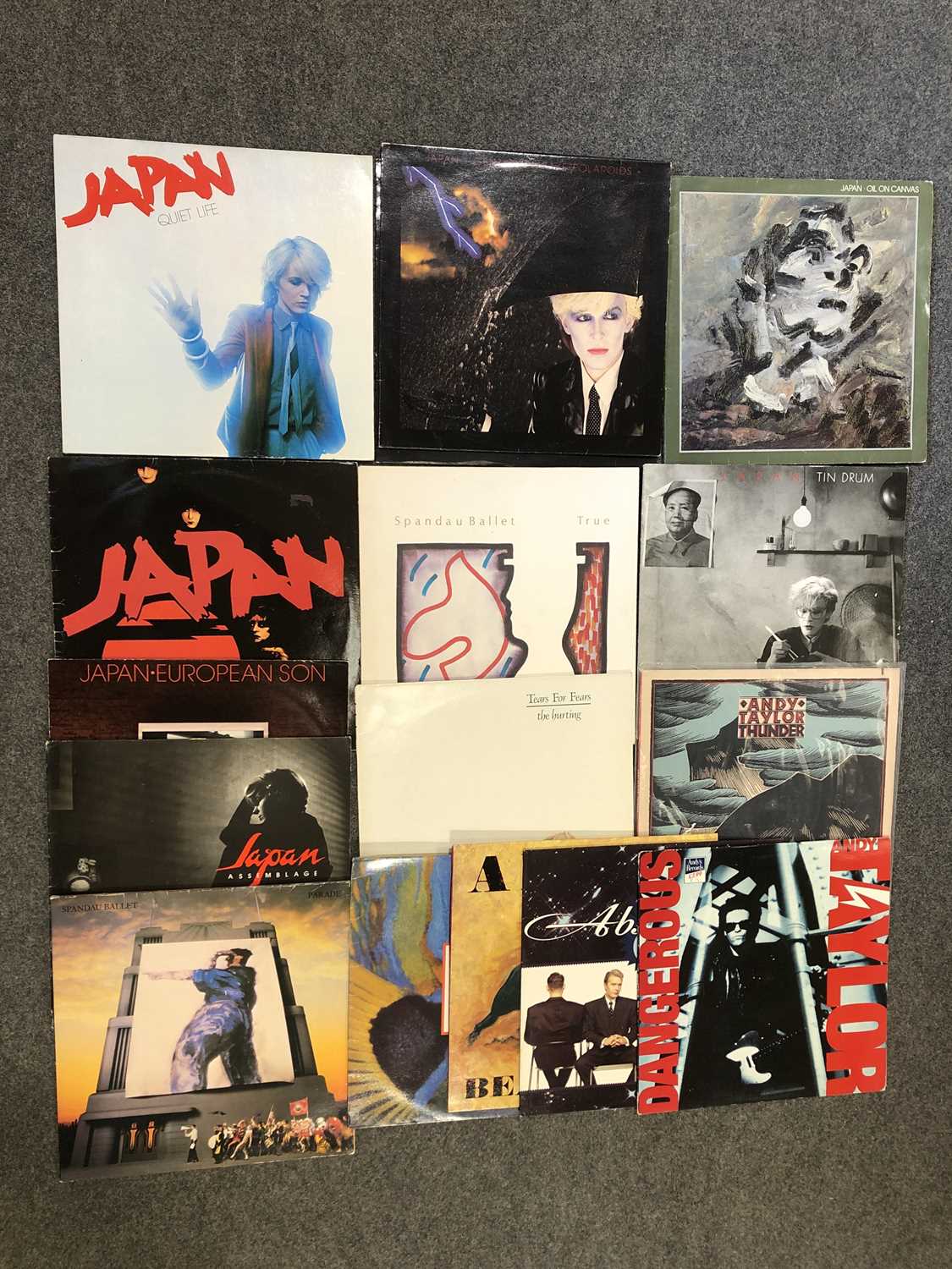 Lot 33 - Sixteen LP and 12" single vinyl records; including six albums by Japan