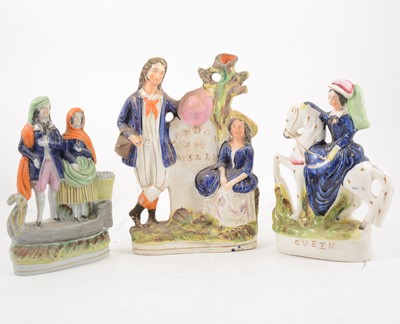 Lot 1054 - Fourteen Staffordshire figures and spill vases