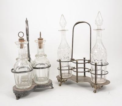 Lot 1077 - Silver plated three bottle tantalus