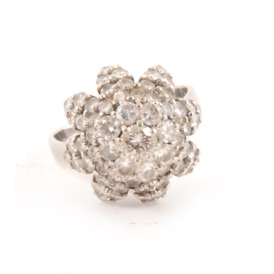 Lot 202 - A diamond cluster cocktail ring.