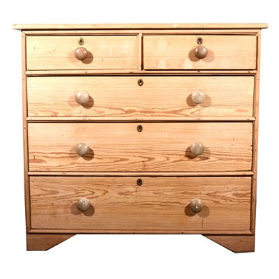 Lot 24 - A stripped pine chest of drawers