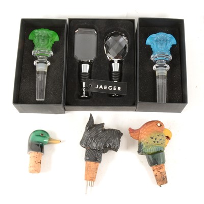 Lot 97 - Two Versace bottle stoppers and a pair of Jaeger stoppers and other vintage stoppers.