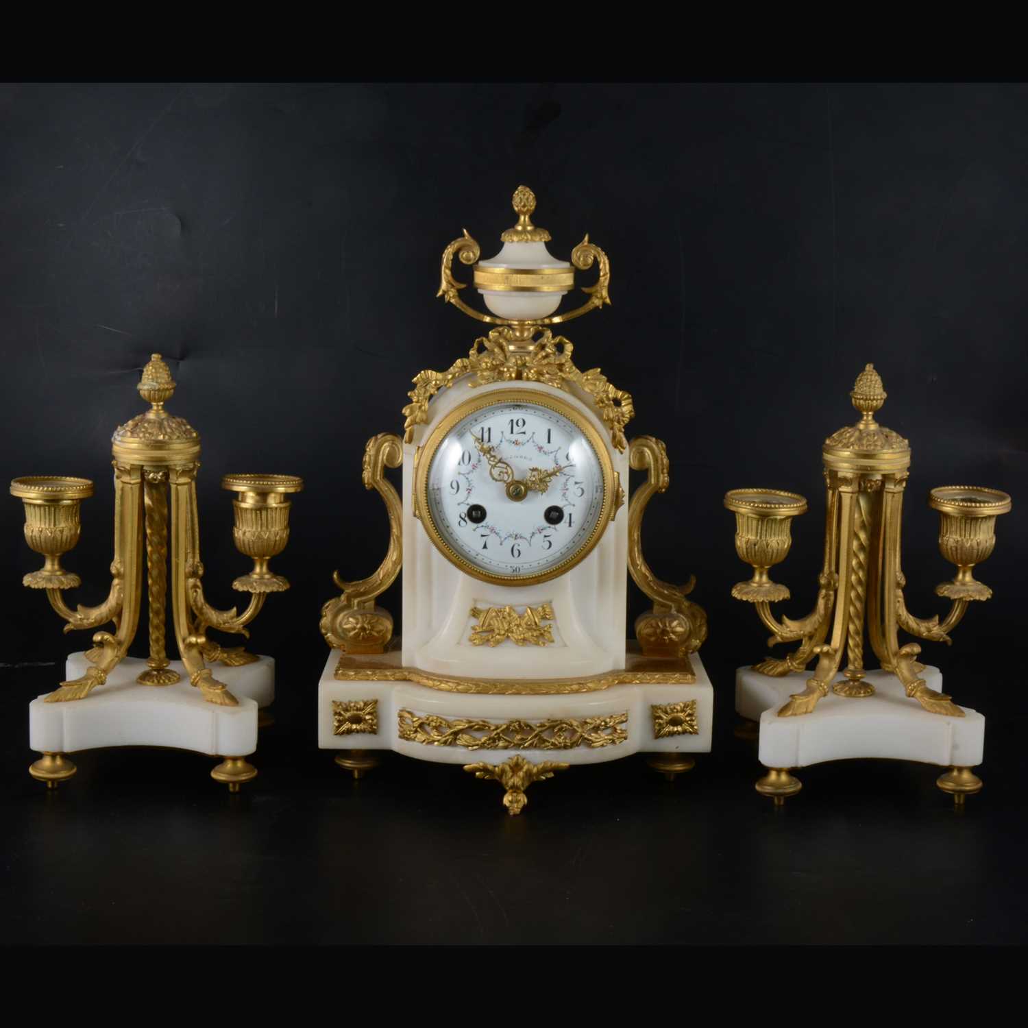 Lot 147 - A Louis XV style white marble and gilt metal three-piece clock garniture