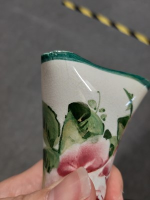 Lot 6 - A Wemyss pottery hatpin holder