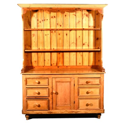 Lot 141 - A stripped pine dresser base