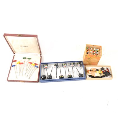 Lot 92 - A collection of novelty cocktail sticks, party picks and place name holders.