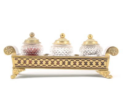 Lot 77 - A Regency brass and tortoiseshell desk stand