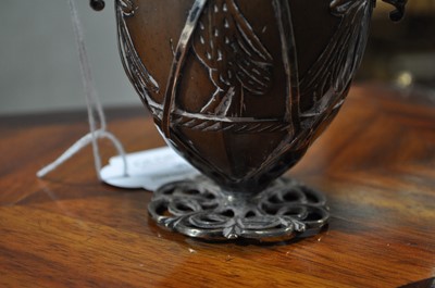 Lot 90 - A white metal mounted coconut cup of ovoid form, pricked date 1590