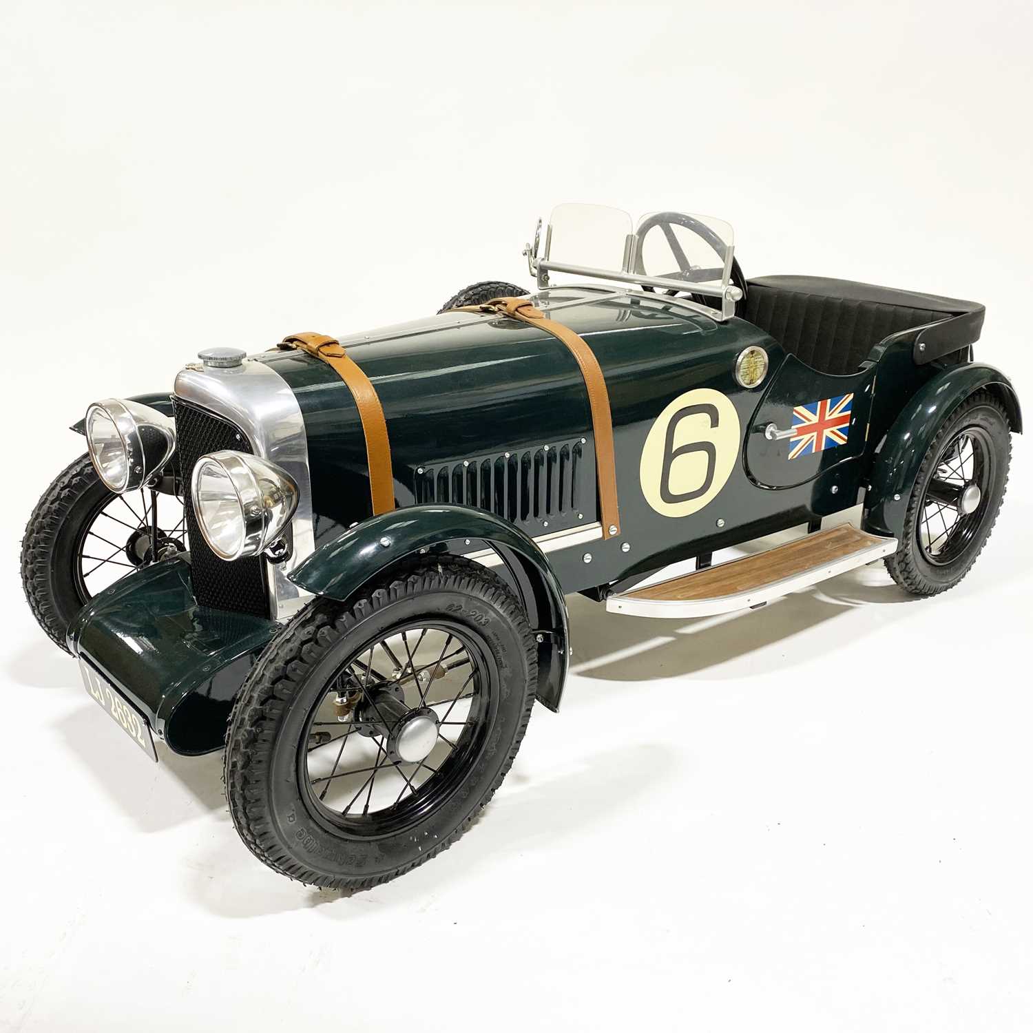 67 - A Bentley Speed 6 pedal car; 1.5m in length, painted with British racing green, no.6 side decals