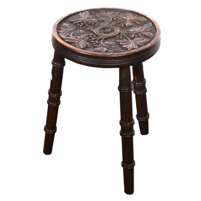 Lot 172 - A carved oak stool, and a turned elm pedestal