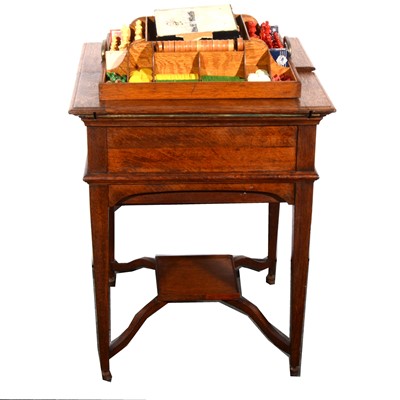 Lot 176 - An Edwardian oak games companion