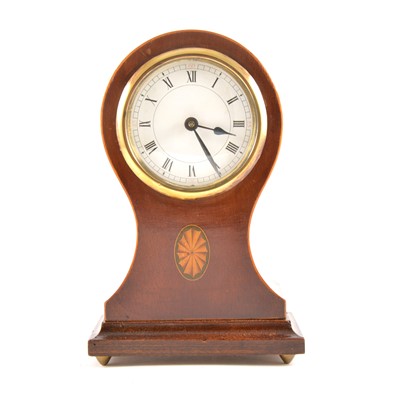 Lot 152 - An Edwardian inlaid mahogany balloon-shape mantel clock
