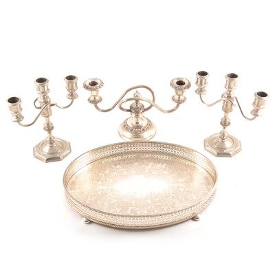 Lot 100 - A pair of plated three-light candelabra, a tray and a two-light candelabra